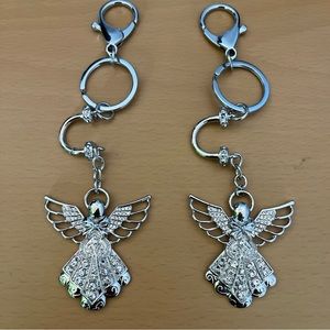 Nwt ‎ Angelitos keychain set 4 pieces silver color